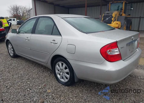 2004 Toyota Camry Xle z USA, uszkodzony, nr VIN 4T1BE32K44U893648